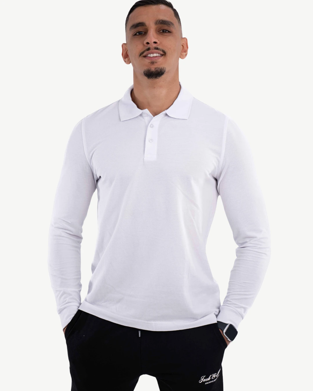 E-114020006-002_A Polo Manches Longues CELIO Homme Blanc – Image 1