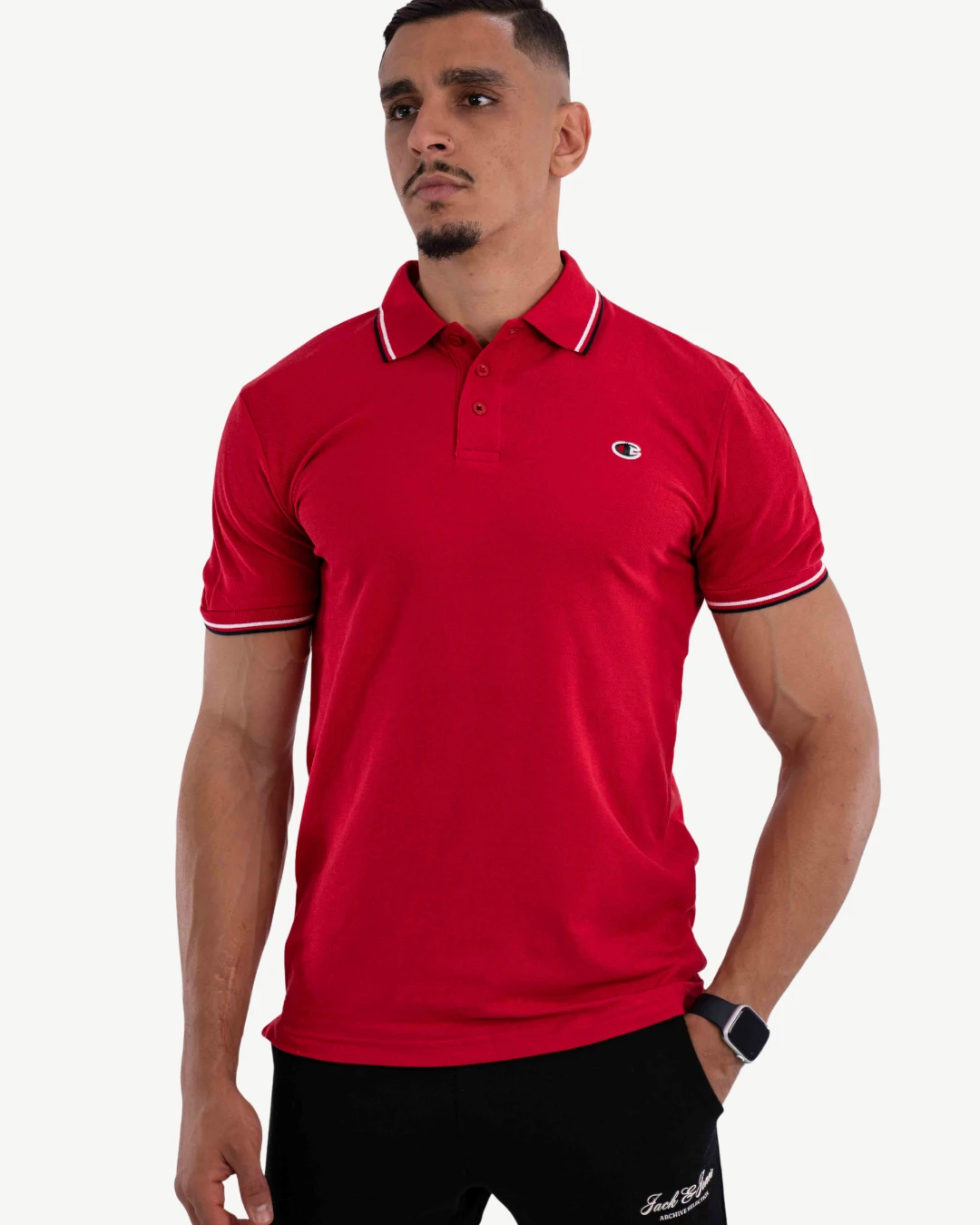 E-115020004-004_A Polo Demi-Manches Champion Rouge – Image 1