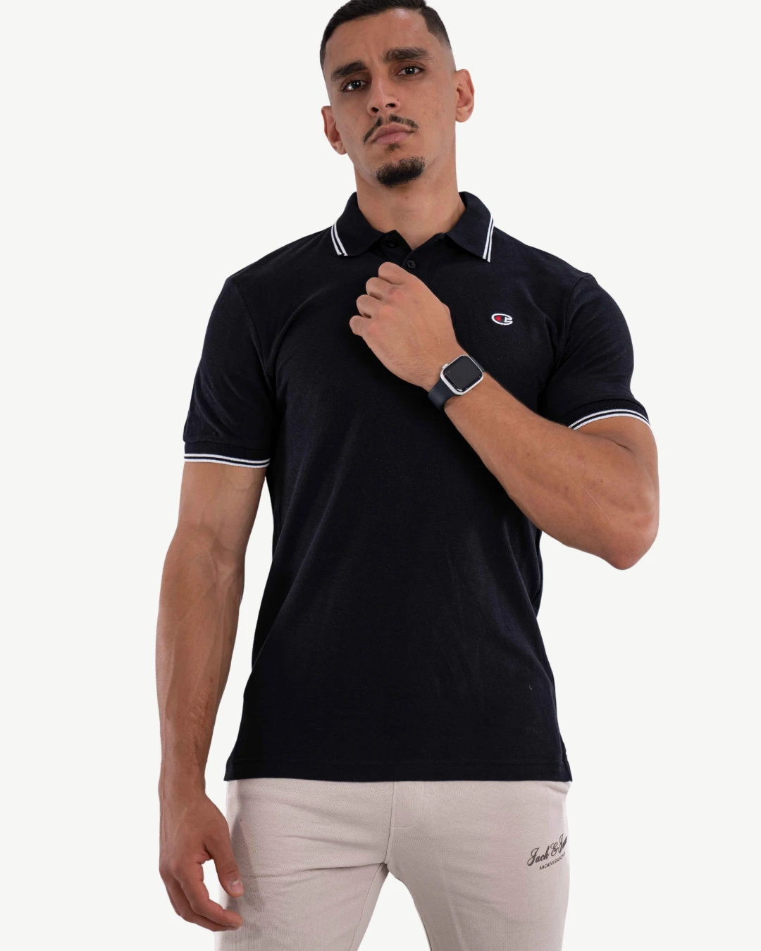 E-115020007-003_A Polo Demi-Manches Champion Noir – Image 1